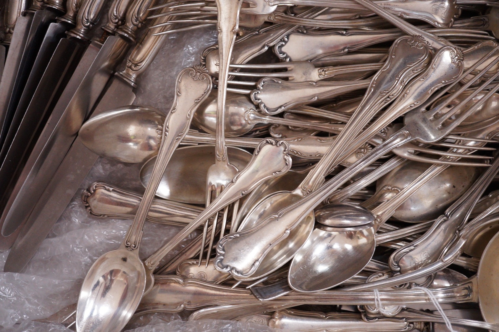 A harlequin part canteen of mainly early 20th century Italian 800 standard white metal Venetian pattern cutlery, comprising eighty items